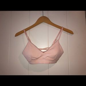 Light pink sports bra. NEVER WORN.